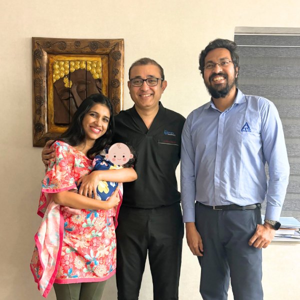 Family smiling after fertility care