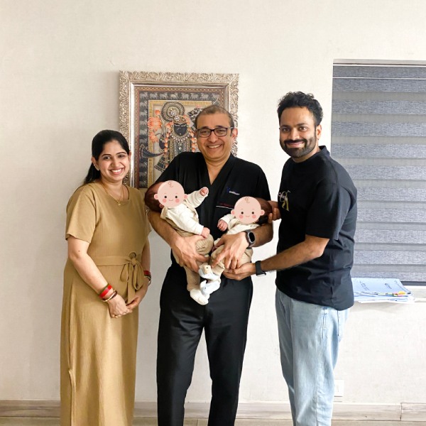Parents smiling with their baby